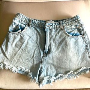 Distressed light blue jean shorts